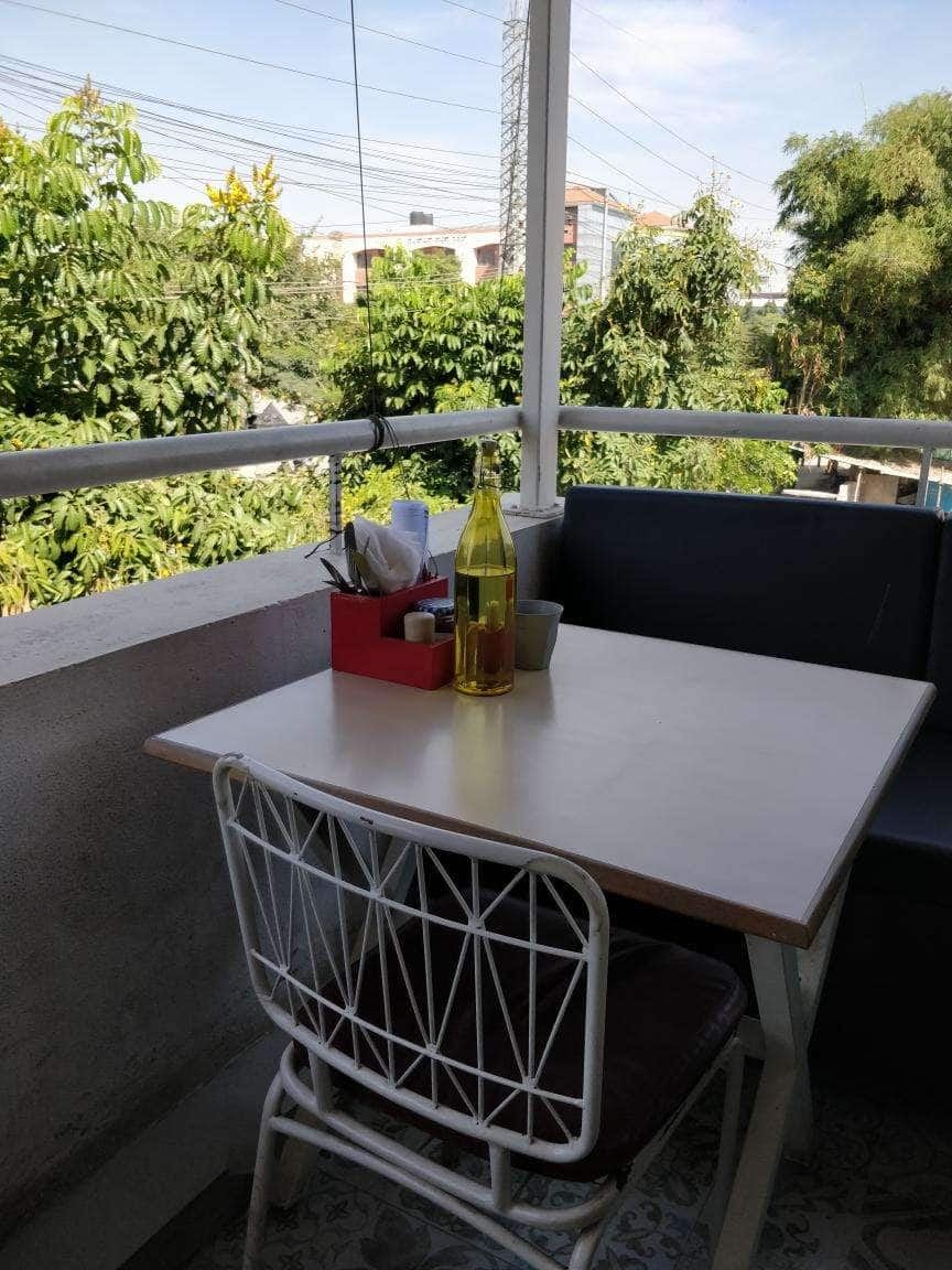 Balcony seating overlooking trees