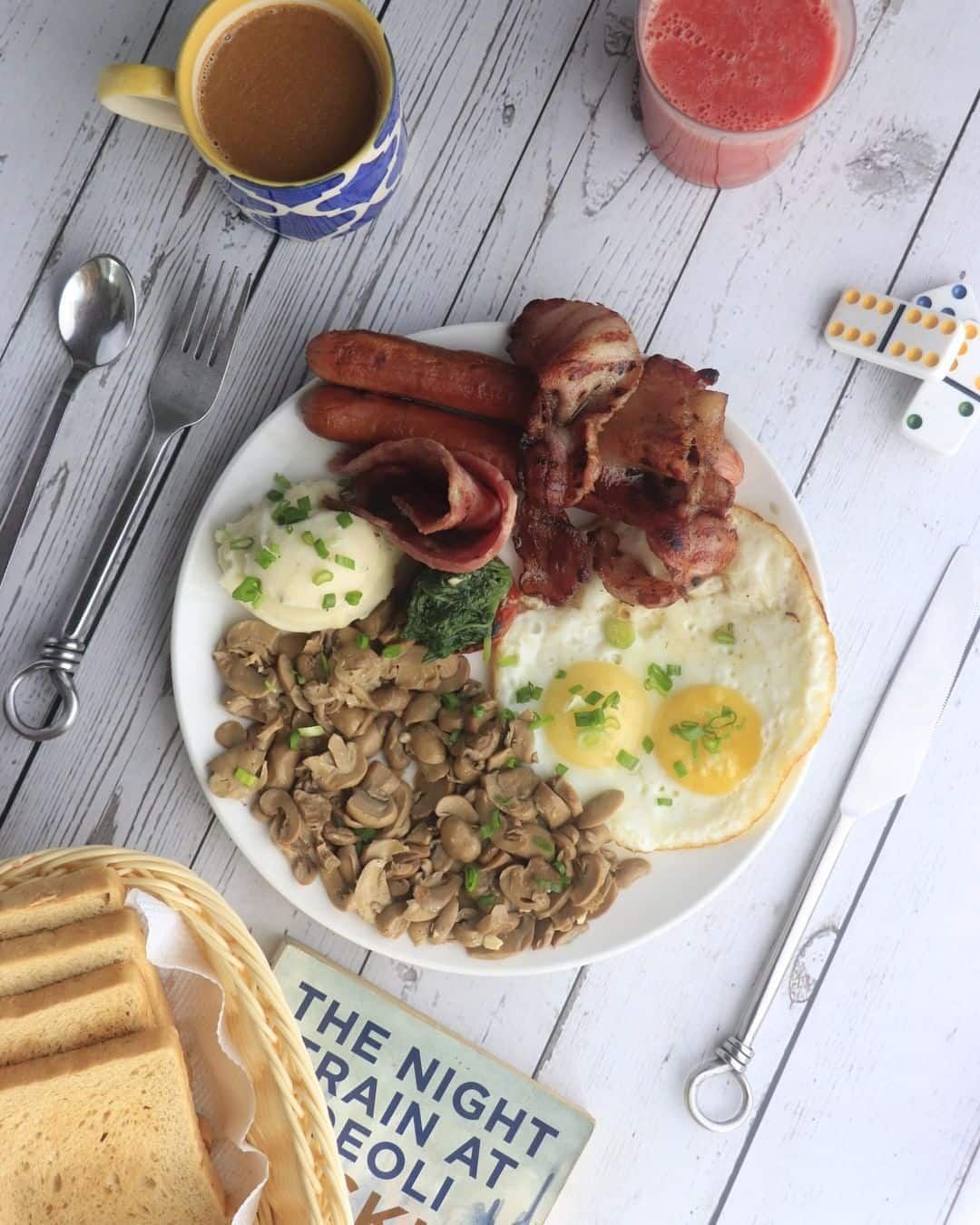 The All-Mighty English Breakfast served next to a paperback novel