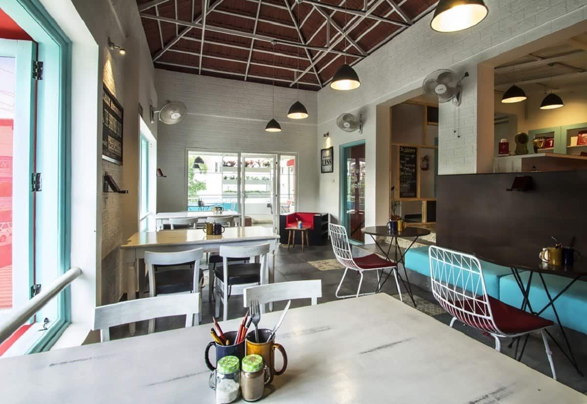 Marble tables and wire chairs